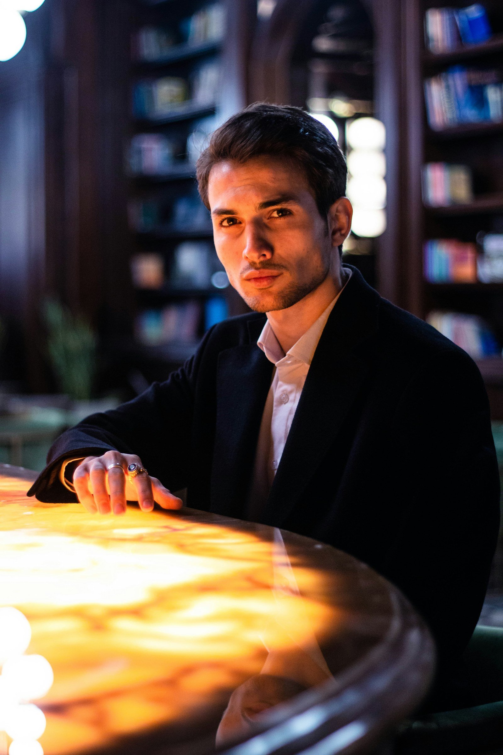 An attorney standing in a law library