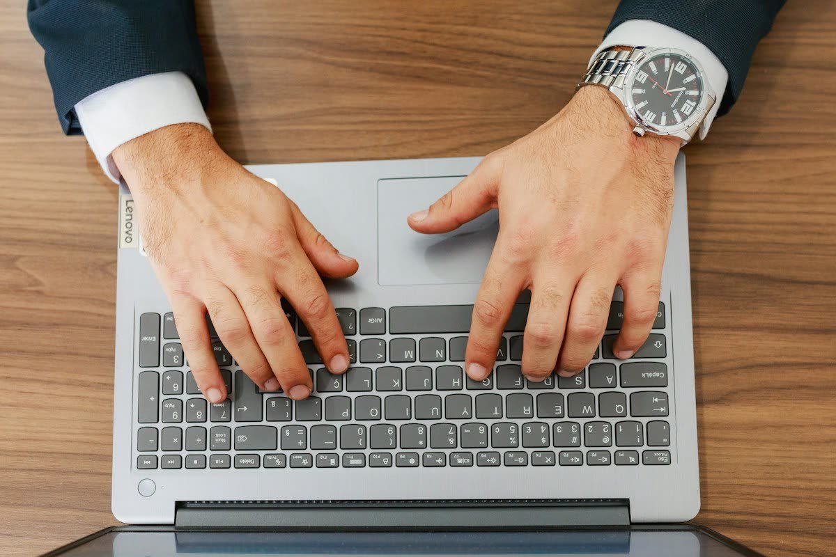 Attorney working on a laptop at a desk
